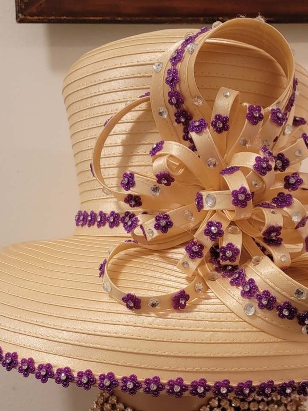 Elegant Cream Wide-Brim Hat with Purple Floral Accents
